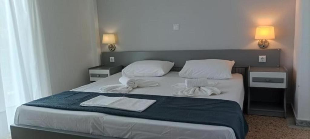 Postel nebo postele na pokoji v ubytování Vanta Hotel
