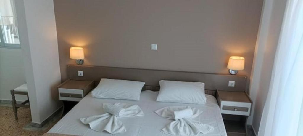 Postel nebo postele na pokoji v ubytování Vanta Hotel