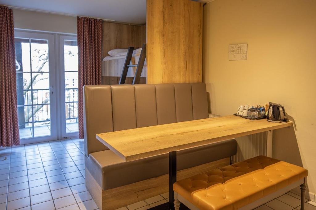 Kuchyň nebo kuchyňský kout v ubytování Blanckthys Hotel Voeren