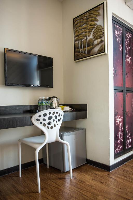 TV a/nebo společenská místnost v ubytování ORO Hotel Kluang