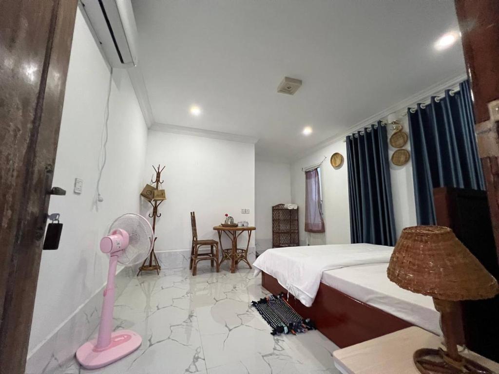 Postel nebo postele na pokoji v ubytování El Ling guesthouse