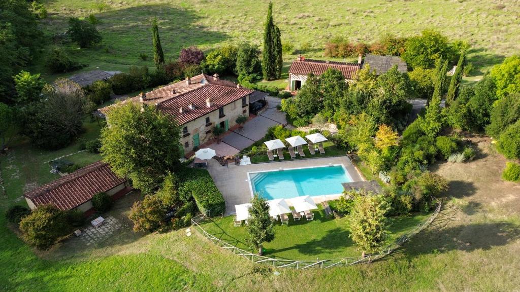 an aerial view of a house with a swimming pool at Villa Poggio alla Staffa in Poderi Foci