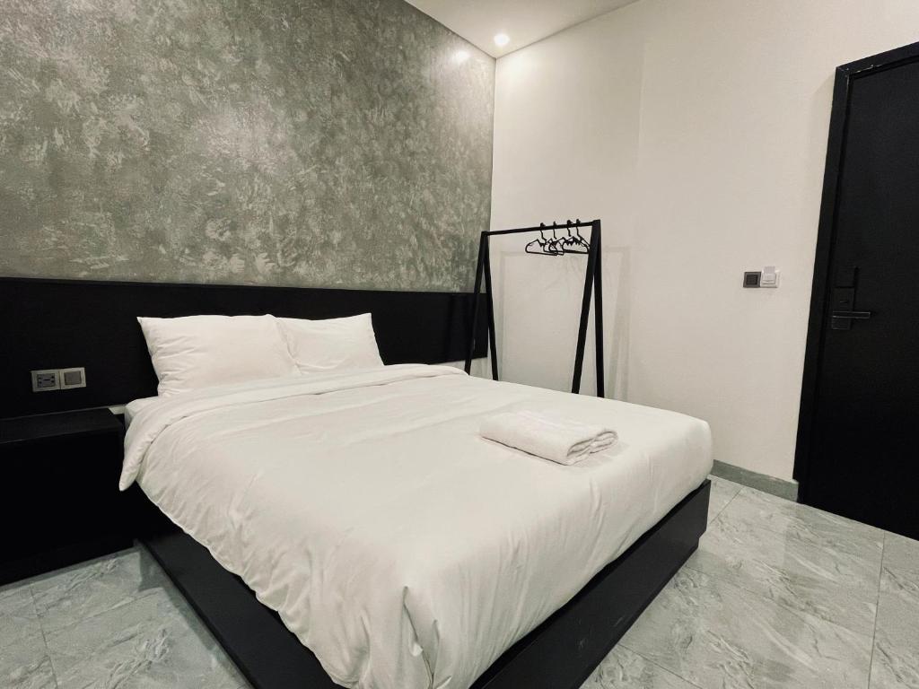 Postel nebo postele na pokoji v ubytování Ben Ben Hotel