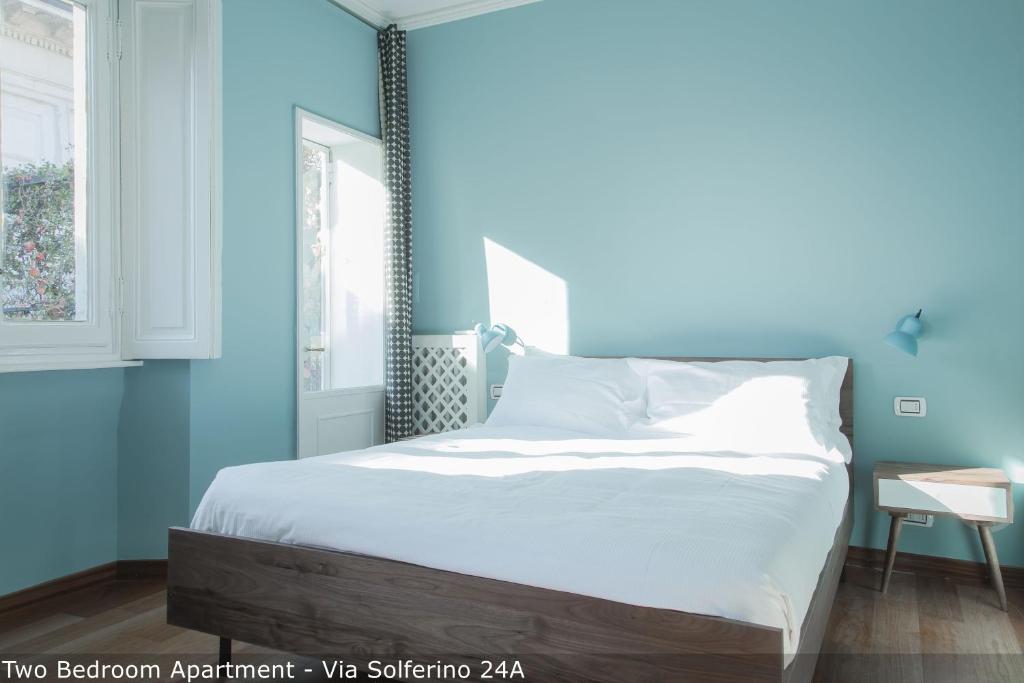 Posteľ alebo postele v izbe v ubytovaní Brera Apartments in San Marco