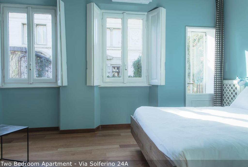 Posteľ alebo postele v izbe v ubytovaní Brera Apartments in San Marco