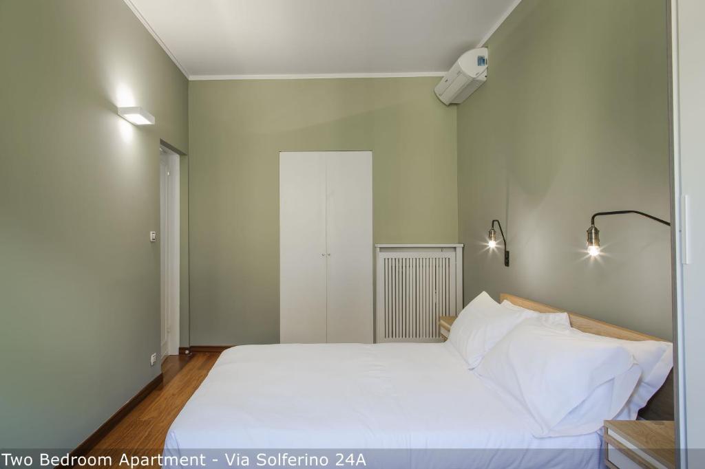 Posteľ alebo postele v izbe v ubytovaní Brera Apartments in San Marco