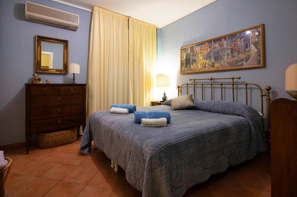Ένα ή περισσότερα κρεβάτια σε δωμάτιο στο Duomo Square Apartment
