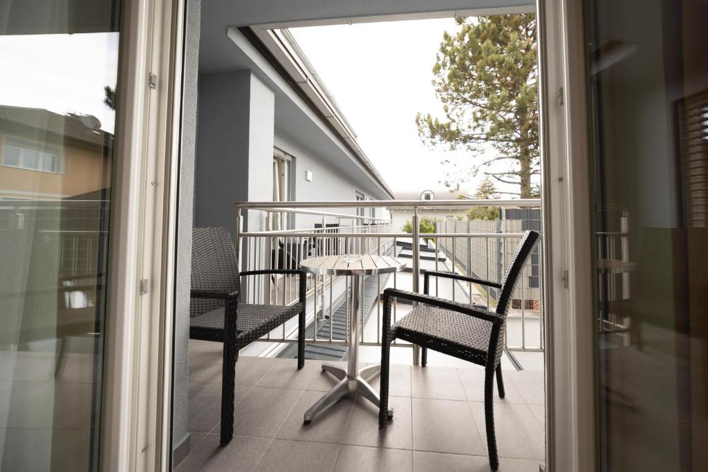 Balkón nebo terasa v ubytování Primus Hotel & Apartments