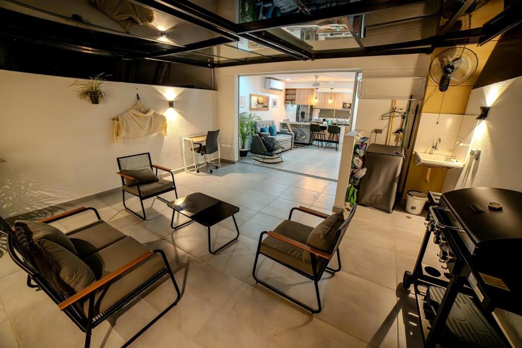 Posezení v ubytování Espectacular Casa de Ensueño "Jacuzzi Privado" en Ricaurte - Peñalisa