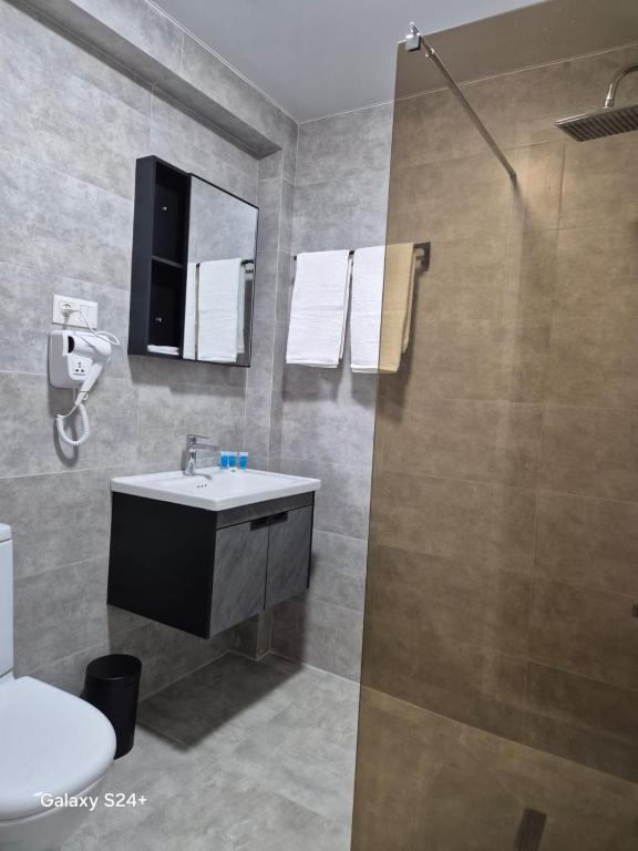 Koupelna v ubytování Hotel Asa