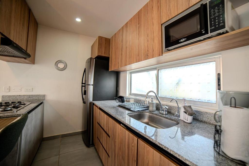 Kuchyň nebo kuchyňský kout v ubytování Espectacular Casa de Ensueño "Jacuzzi Privado" en Ricaurte - Peñalisa
