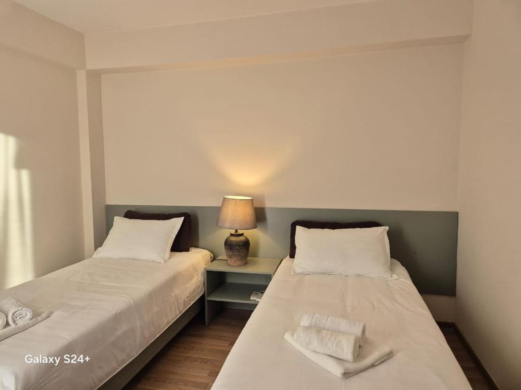 Postel nebo postele na pokoji v ubytování Hotel Asa