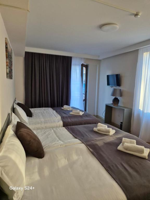 Postel nebo postele na pokoji v ubytování Hotel Asa