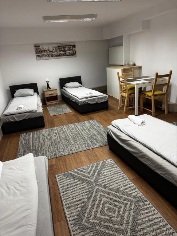 Postel nebo postele na pokoji v ubytování ESA Home