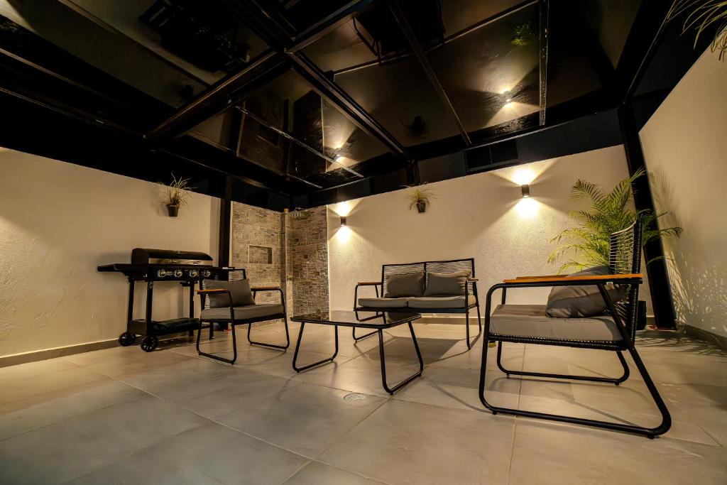 Posezení v ubytování Espectacular Casa de Ensueño "Jacuzzi Privado" en Ricaurte - Peñalisa