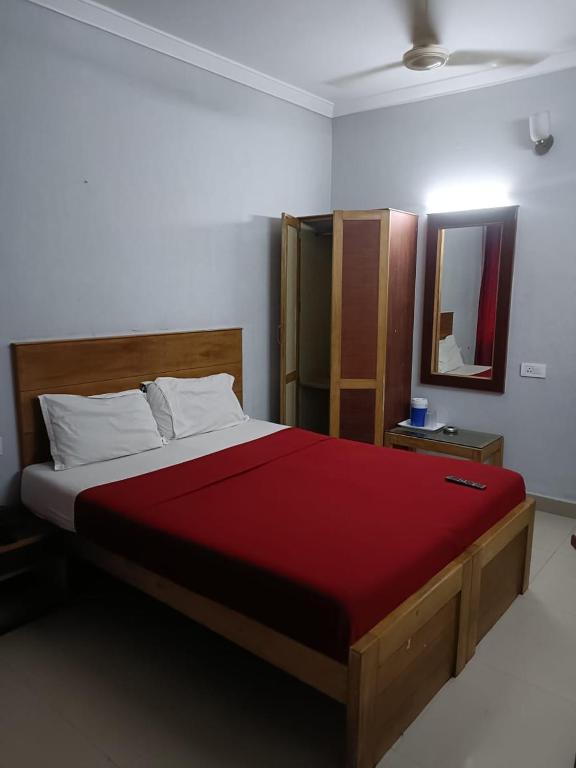 Postel nebo postele na pokoji v ubytování sun city