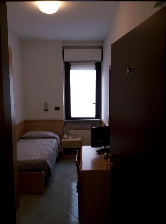 Posteľ alebo postele v izbe v ubytovaní Hotel Cristallo
