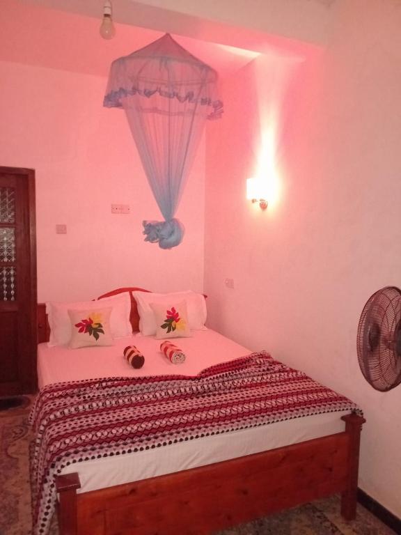 Postel nebo postele na pokoji v ubytování Mature Home Ella