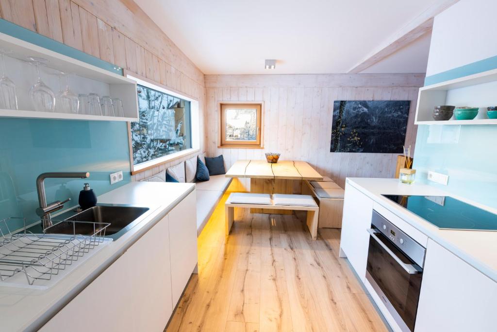 Kuchyň nebo kuchyňský kout v ubytování Designferienhaus Altenmarkt Zauchensee