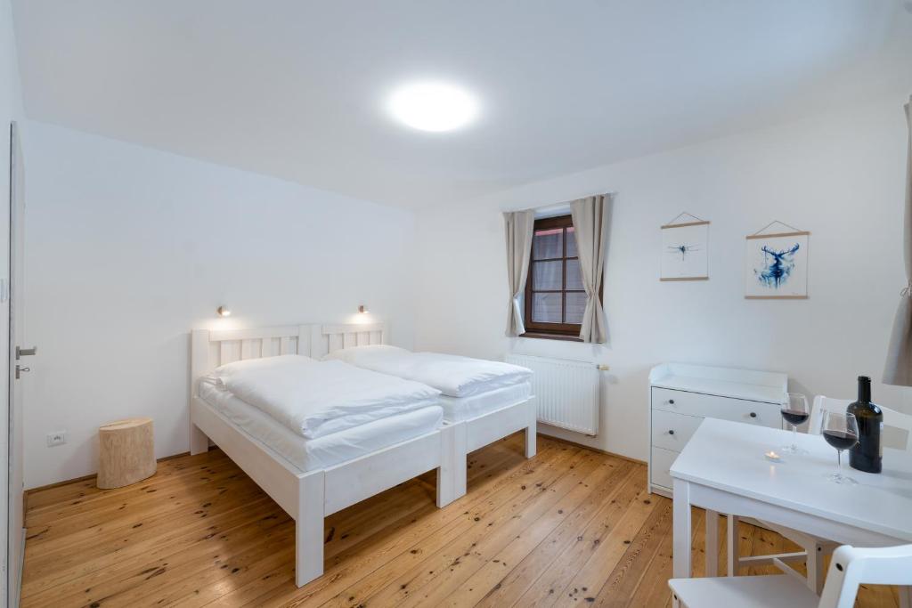 Postel nebo postele na pokoji v ubytování Avama - apartmány Srní
