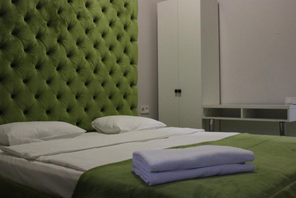 Postel nebo postele na pokoji v ubytování De Paris Hotel