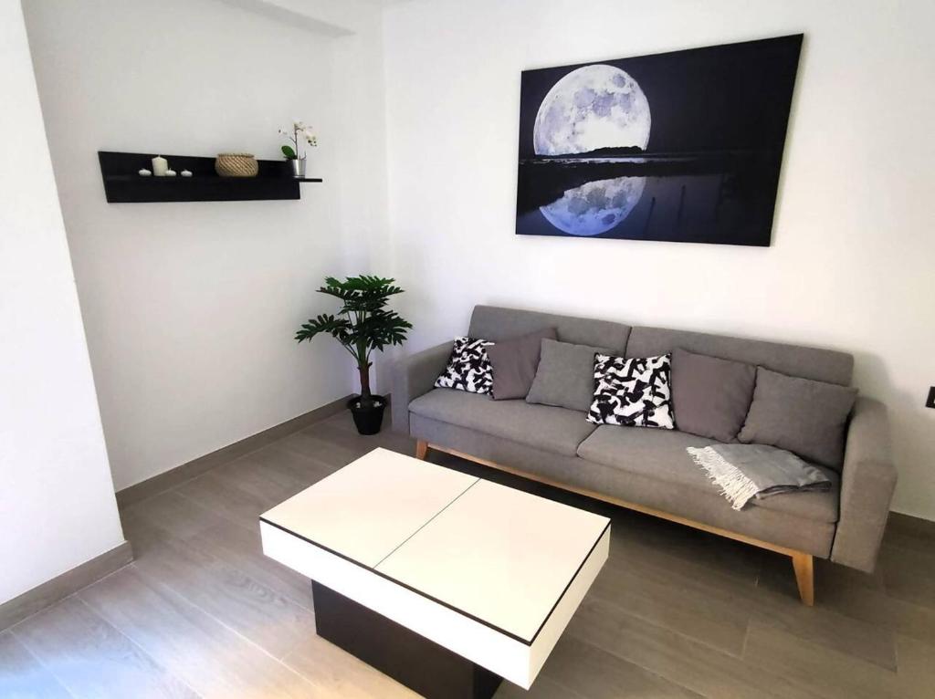 Posezení v ubytování Apartamento con Jacuzzi El Rincón de Ayud