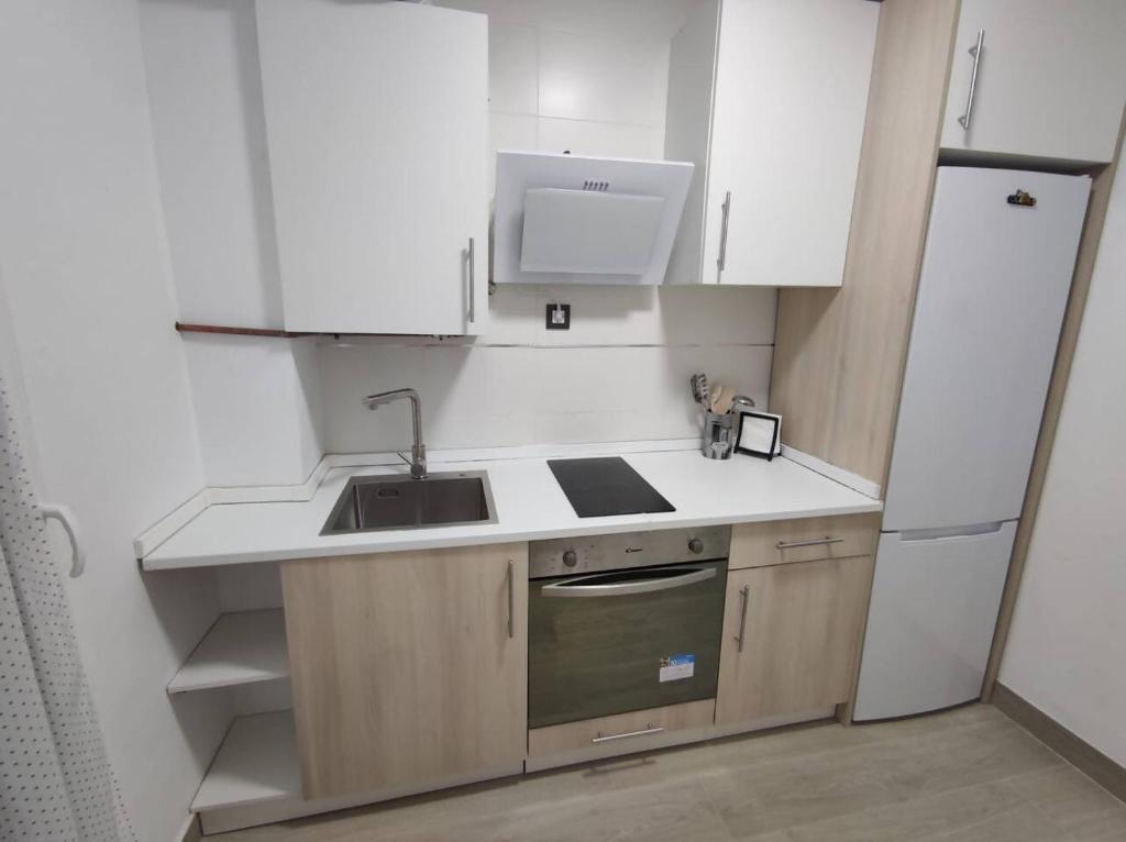 Kuchyň nebo kuchyňský kout v ubytování Apartamento con Jacuzzi El Rincón de Ayud