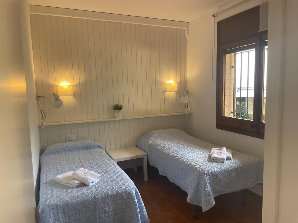 Posteľ alebo postele v izbe v ubytovaní Cubells 2 Apartamento cercano a la playa