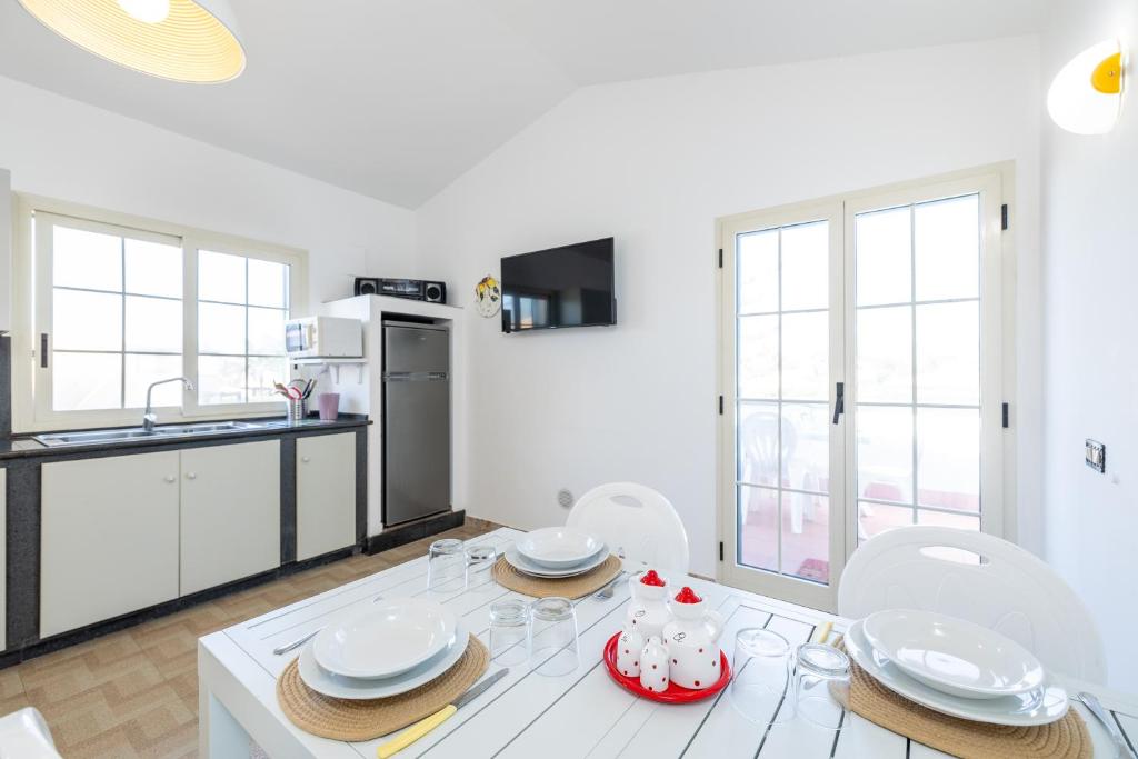 Kuchyň nebo kuchyňský kout v ubytování Sole Mare Deluxe