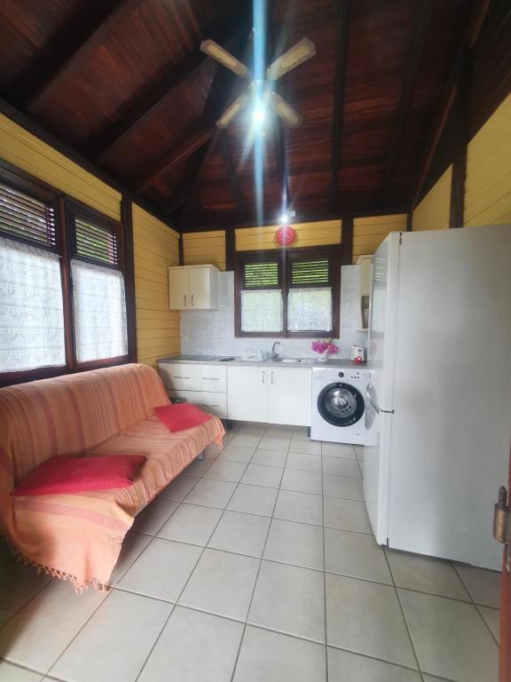 Kuchyň nebo kuchyňský kout v ubytování Cottage La Pointe Marine Deshaies