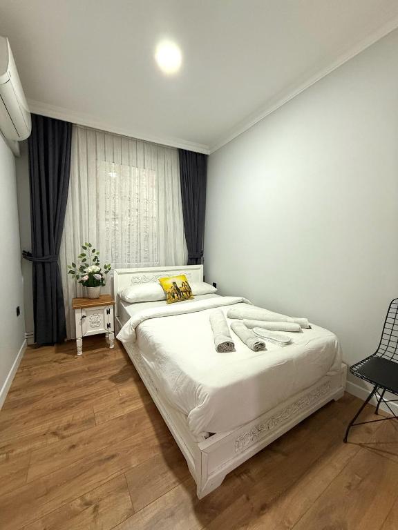 Postel nebo postele na pokoji v ubytování GV Suites Galata