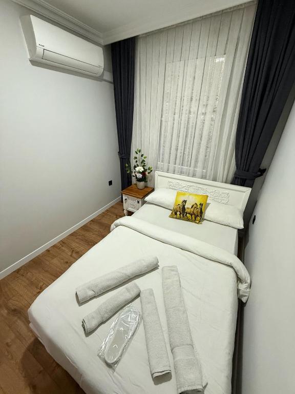 Postel nebo postele na pokoji v ubytování GV Suites Galata