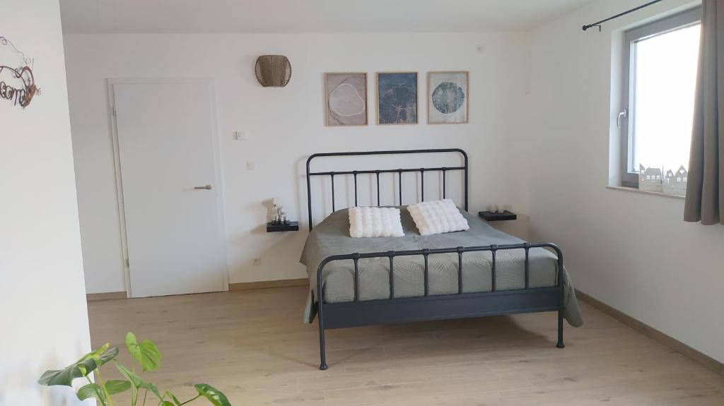Postel nebo postele na pokoji v ubytování Bois de rose