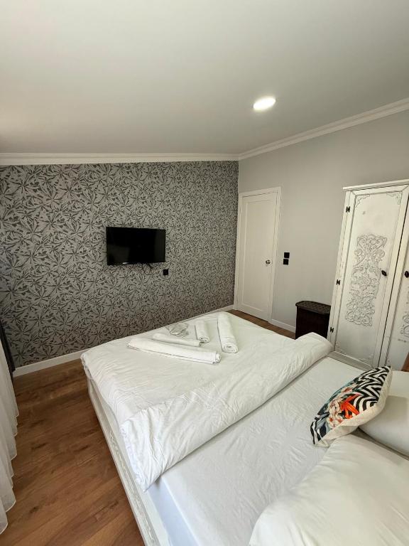 Postel nebo postele na pokoji v ubytování GV Suites Galata