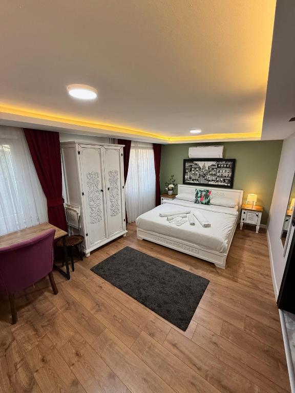Postel nebo postele na pokoji v ubytování GV Suites Galata