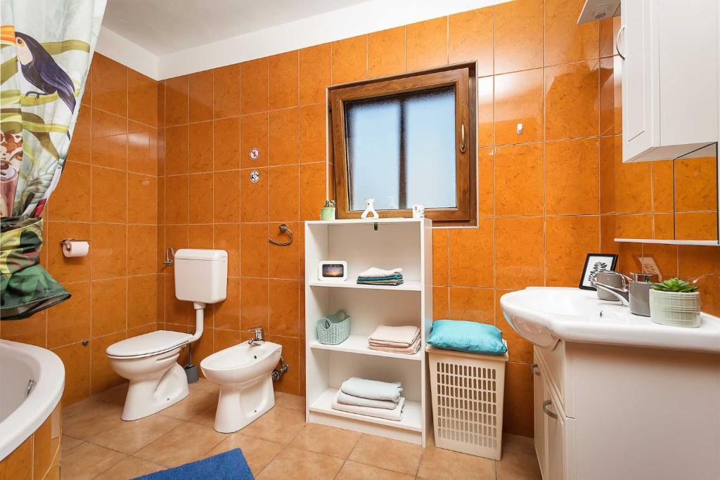 Koupelna v ubytování Holiday Home Pina