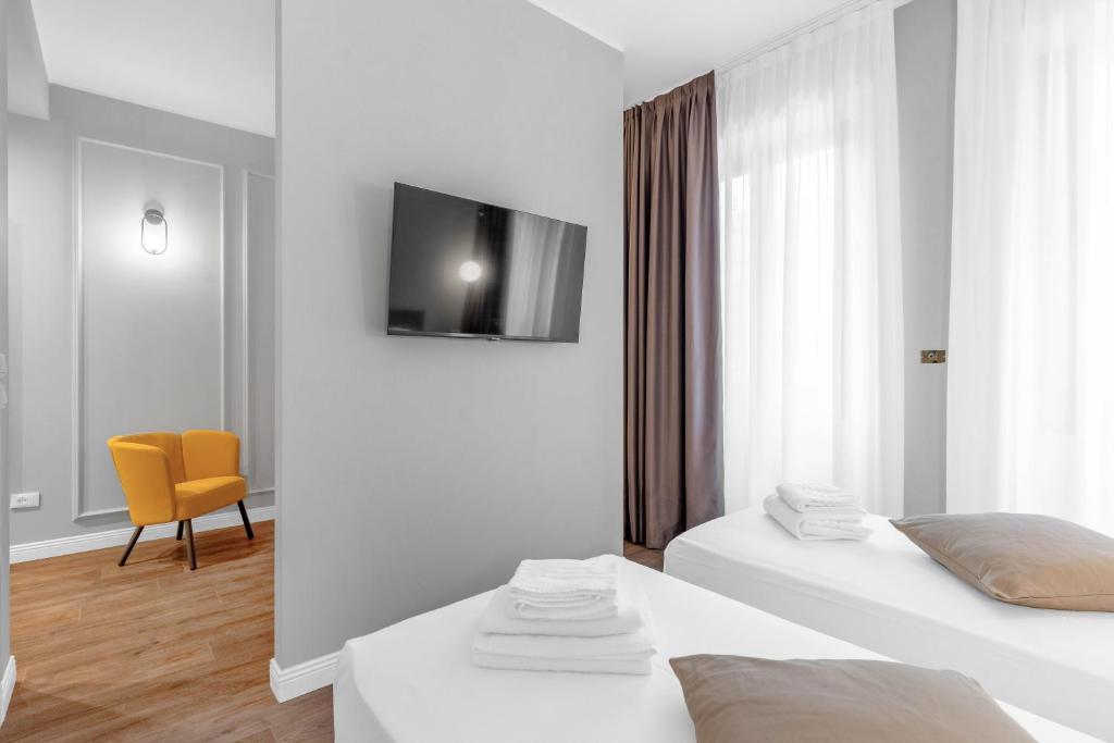 Torriani Suites Foresteria Lombarda - Resim 6