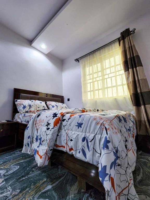 Postel nebo postele na pokoji v ubytování JJ Apartment