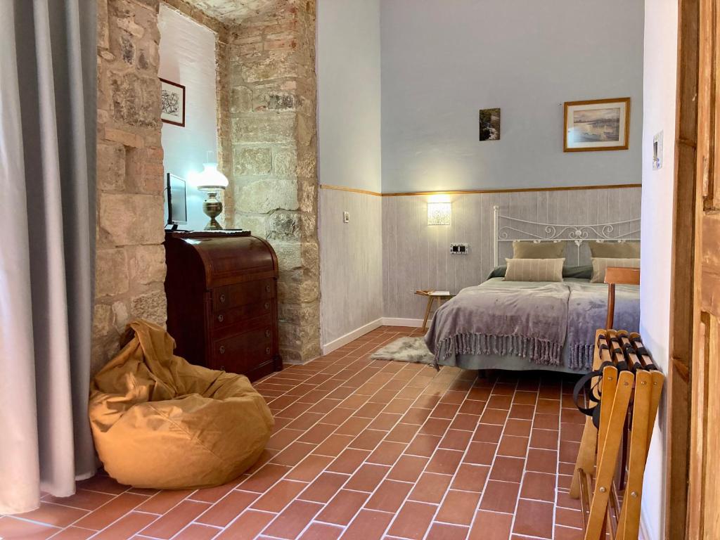 Postel nebo postele na pokoji v ubytování Cal Carlà de Belltall