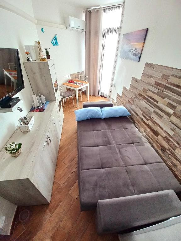 TV a/nebo společenská místnost v ubytování L'incanto Blu