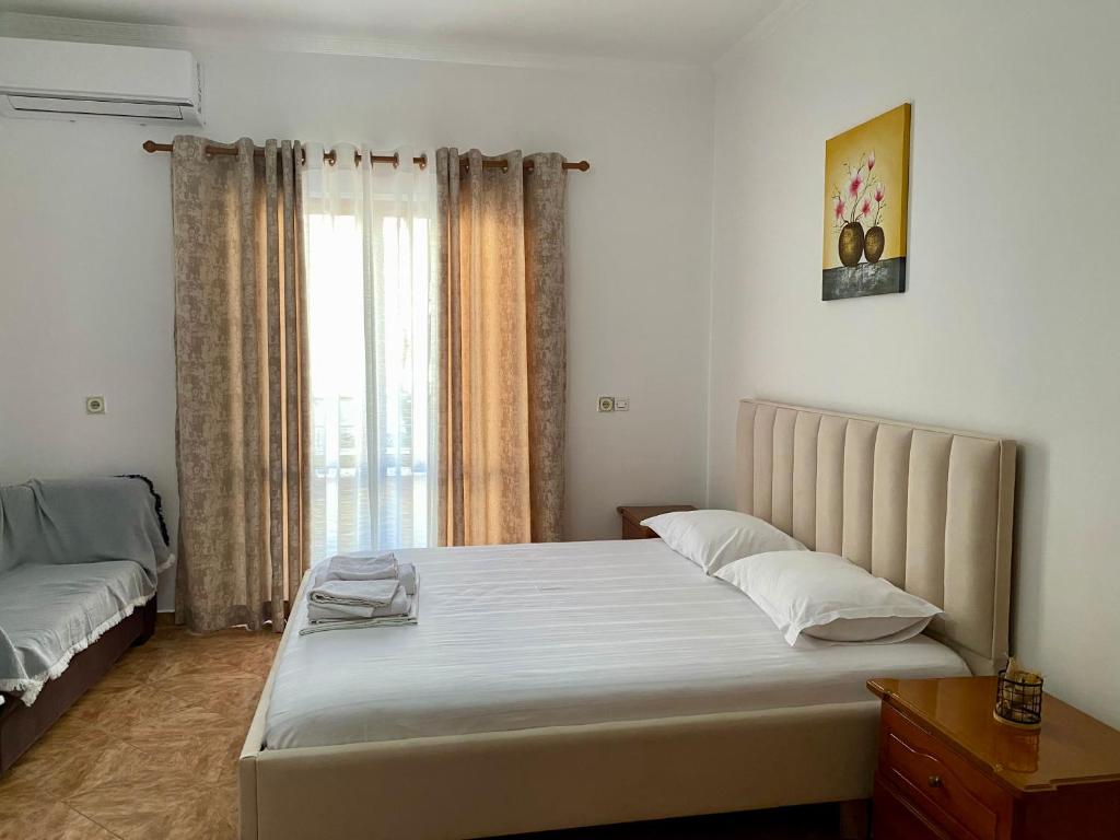 Postel nebo postele na pokoji v ubytování Hotel Metali
