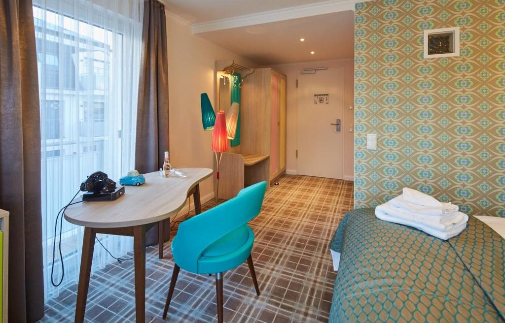 Postel nebo postele na pokoji v ubytování Bernstein Hotel "50`s Seaside Motel"