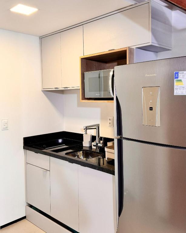A cozinha ou cozinha compacta de Estilo Itacaré best location