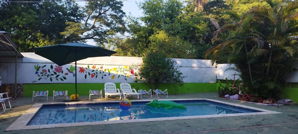 The swimming pool at or close to Hostal Maison Belle