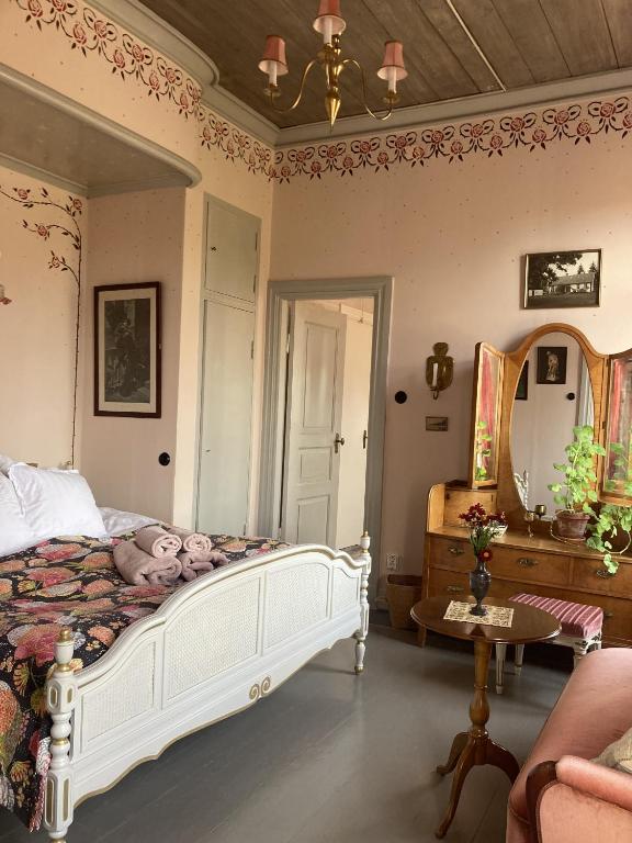 Postel nebo postele na pokoji v ubytování Osaby Säteri