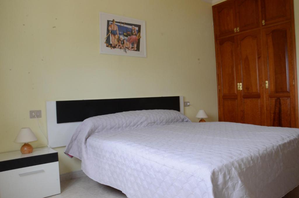 Posteľ alebo postele v izbe v ubytovaní Casa la Ermita