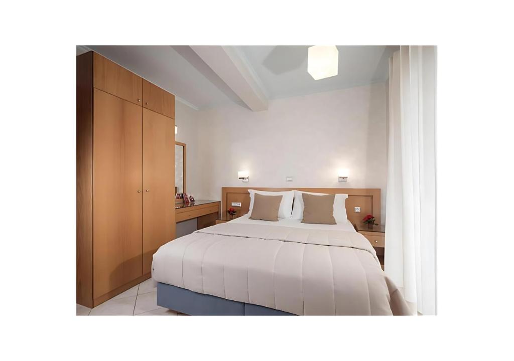 Postel nebo postele na pokoji v ubytování Plaza Hotel