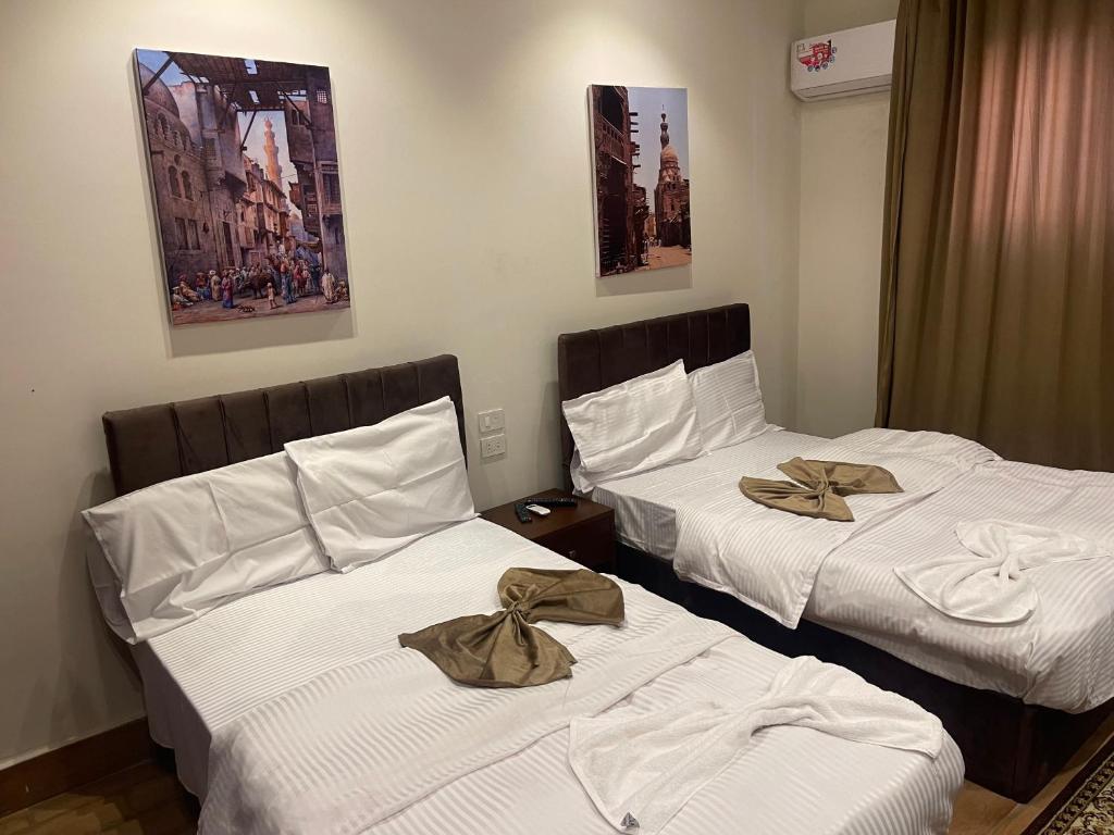 Postel nebo postele na pokoji v ubytování Motel 5 Square