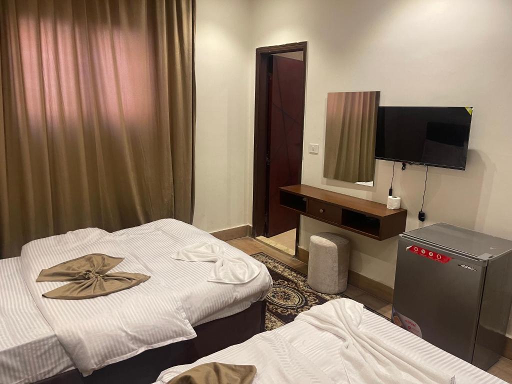 Postel nebo postele na pokoji v ubytování Motel 5 Square