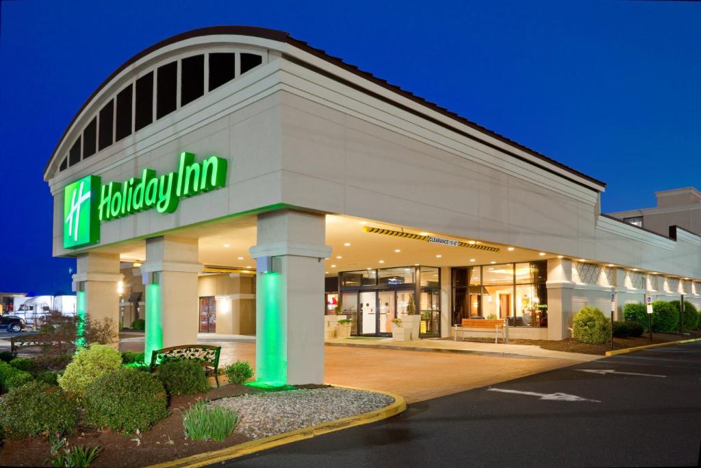 a walmart building with a green sign on it at Holiday Inn South Plainfield-Piscataway by IHG in South Plainfield